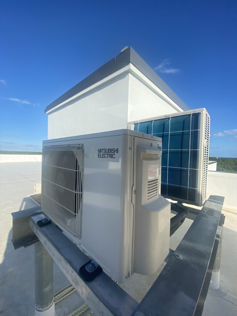 Split-Unit-on-a-building-roof-by-Caytech-AC-Cayman-scaled